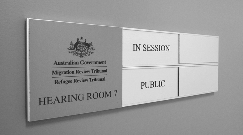 Hearing Room Sign when in session if the hearing is open to Public.